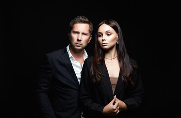 Couple. Adorable, elegant girl seducing her handsome boyfriend