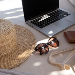 Beautiful feminine fashion summer accessories. Stylish women's sunglasses, straw hat, shopper bag,...