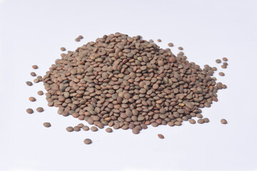 heap of pardina lentils on white background