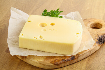 Maasdam cheese over the board