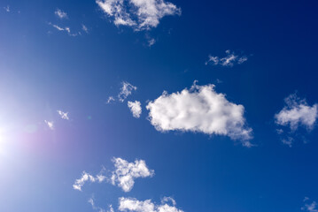 Blue sky background with white clouds.Cloudscape. Sunny day. Cumulus cloud.