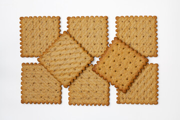 Pattern of spicy wholegrain rye crackers. Isolated. Top view, flatlay.