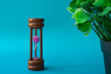 Hourglass as time passing concept for business deadline and running out of time