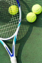Tennis balls on a tennis court - obrazy, fototapety, plakaty