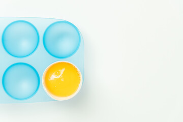 One broken egg with yolk