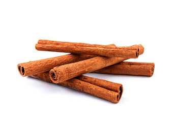 Fragrant cinnamon sticks isolated on white background