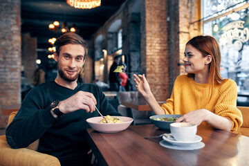cheerful young couple communication restaurant leisure lifestyle