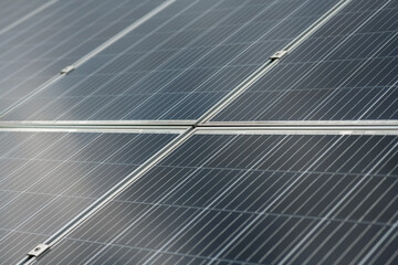 Large dark gray solar panel surface