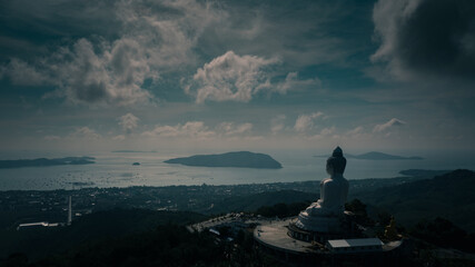 Naklejka na ściany i meble Big Buddha statue on top of mountain view point Phuket thailand