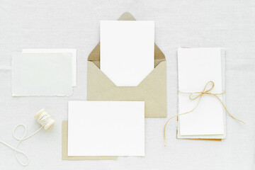 White paper note set on fabric textured background