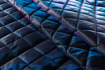 the surface of blue-violet jacket fabric with padding polyester folded