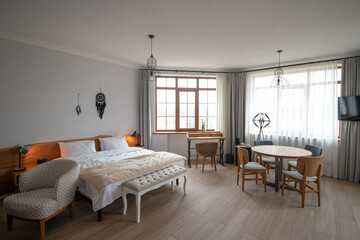 Large bright room with furniture in new house