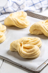 Process of making swirling buns.