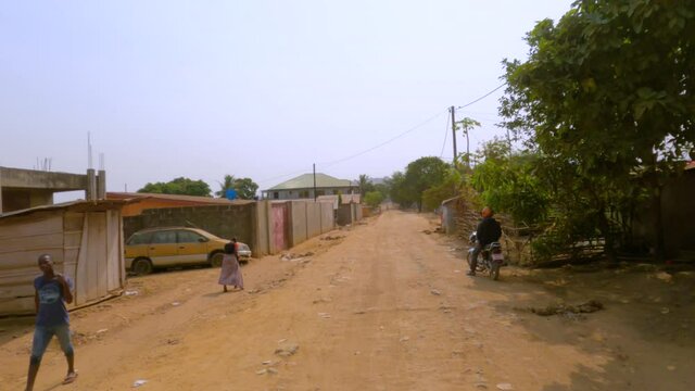Freetown Sierra Leone poor rural village POV part 1. Sierra Leone on the coast of west Africa is a nation that suffers with extreme poverty and hunger. Congested crowded homes