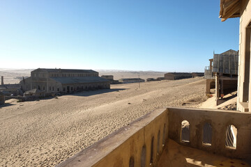 kolmanskop ghost town, old mining town, abandoned houses buried by desert sand