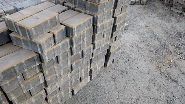 Lots of paving material. Construction paving stones.