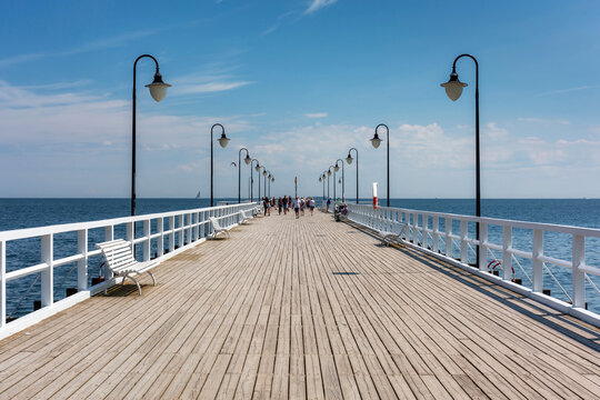 Fototapeta Summer scenery of the Baltic Sea at the pier in Gdynia Orlowo, Poland