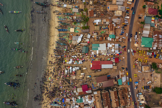 Rural Coastal Town And Boats In Sea
