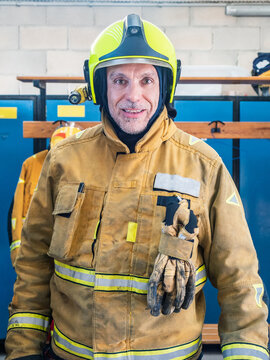 Fireman ready and in his helmet in fire department