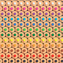 Seamless pattern with rows of colored pencils. Vector colored background.
