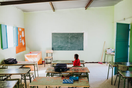 Black boy in the middle of class