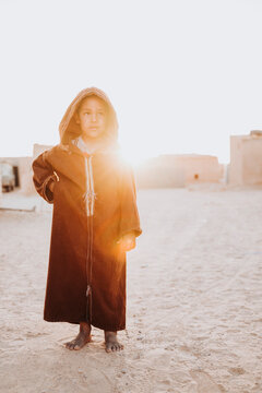 Front view of ethnic kid standing