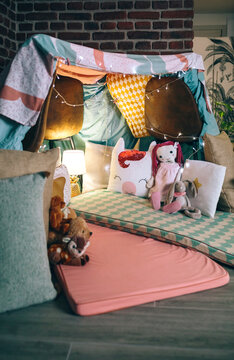 Makeshift Kids Tent Made With Chairs And Bed Sheets At Home