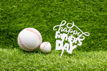 Happy Father's Day to Baseball player on green grass background