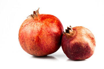 Pomegranates. Natural rural pomegranates isolated on white background. Part of set.