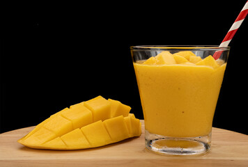 Mango smoothie with mango cubes.