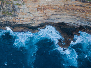 Top down view of seascape around the cliff.