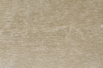 A fragment of a relief plastered wall of a building.