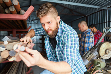 Craftsman during a quality control in the material warehouse