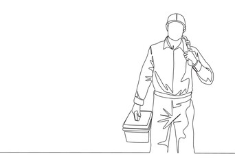 One continuous line drawing of young attractive plumber carrying tools box and ready to do home kitchen pipe service. House maintenance service concept single line draw design illustration