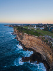 Fototapeta na wymiar Aerial view of Sydney cliff coastline around Macquarie Lighthouse.