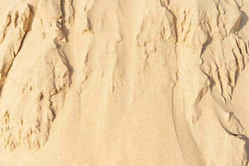 Fototapeta na wymiar Sand pattern texture for background. Brown desert pattern from tropical beach.