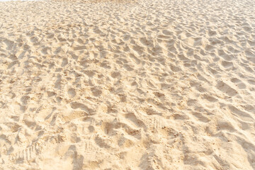 Sand pattern texture in tropical beach as background.