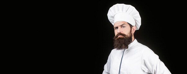 Portrait of a serious chef cook. Chef, cooks or baker. Bearded male chefs isolated on black. Cook...