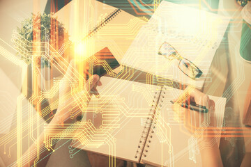 Double exposure of woman on-line shopping holding a credit card and world map hologram drawing. International E-commerce concept.