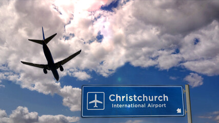 Plane landing in Christchurch New Zealand airport with signboard - obrazy, fototapety, plakaty