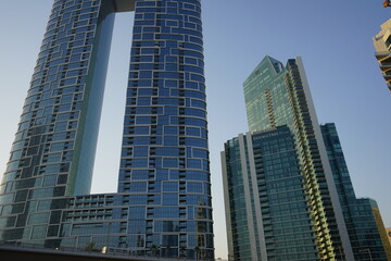 Fototapeta na wymiar Building with a whole in Dubai
