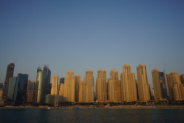 Fototapeta na wymiar Sunset view on buildings in Dubai Marina