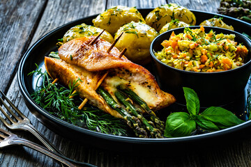 Stuffed turkey breast with mozzarella and asparagus,    boiled potatoes and fresh vegetable salad...
