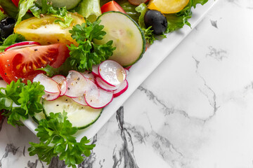 Fresh chopped vegetables in a salad bowl. Healthy eating. Vegetarian food. Healthy nutrition concept. Close up. . High quality photo