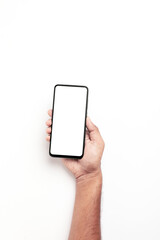 Hand holding a smartphone on a white background.