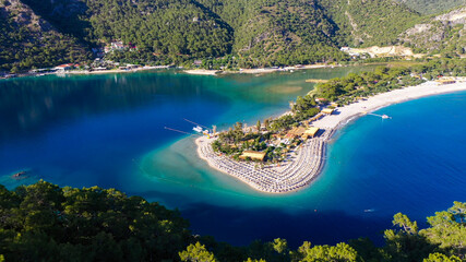Ölüdeniz is a small neighbourhood and beach resort in the Fethiye district of Muğla Province, on the Turquoise Coast of southwestern Turkey, at the conjunction point of the Aegean and Mediterranean se © Tarik GOK