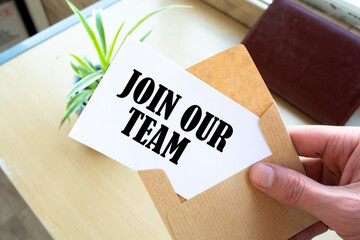 Join Our Team Concepts - Hand holding a envelope and post card