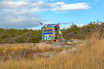 Recycled Material Shed at Beach in Norway