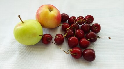 Ripe cherries and apples