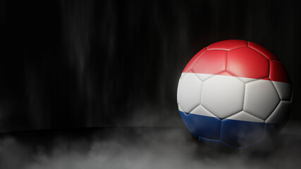 Fototapeta premium Soccer ball in flag colors on a dark abstract background. Netherlands. 3D image.